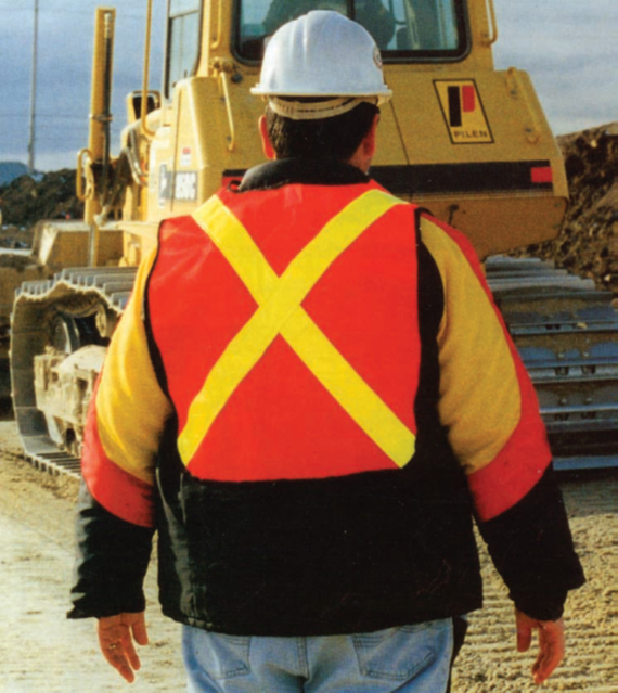 Construction worker wearing a safety vest.